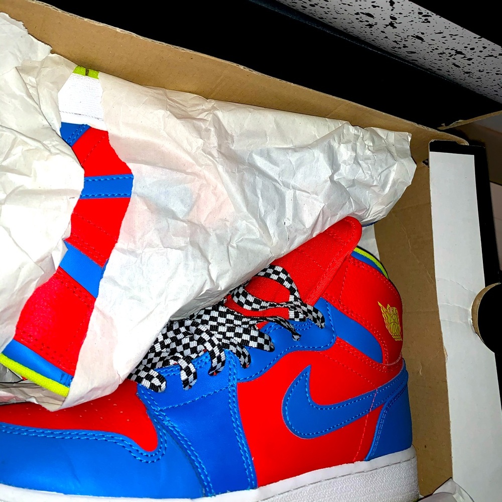 Red , blue , white Jordan 1’s